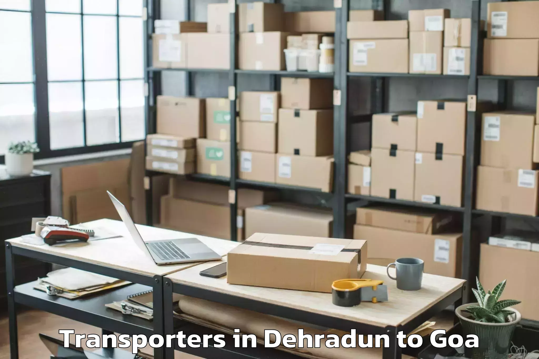 Book Dehradun to Valpoi Transporters Online